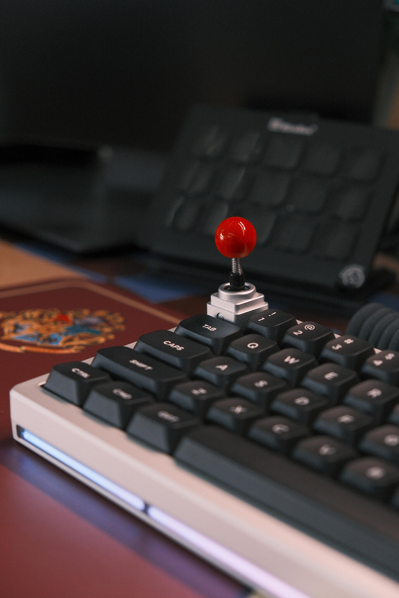 How the Anodized Silver Keyboard with Red Trackpoint Enhances My Work Mood